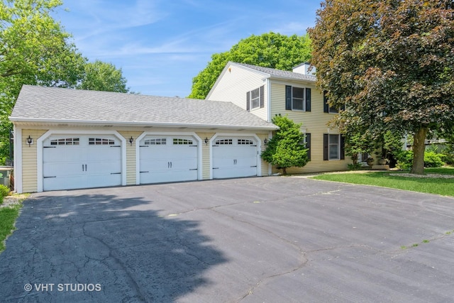 65 Old Post Rd, Montgomery, IL 60538 - view of front of house with a shingled roof