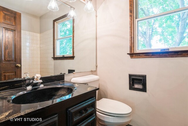 65 Old Post Rd, Montgomery, IL 60538 - bathroom featuring toilet and vanity