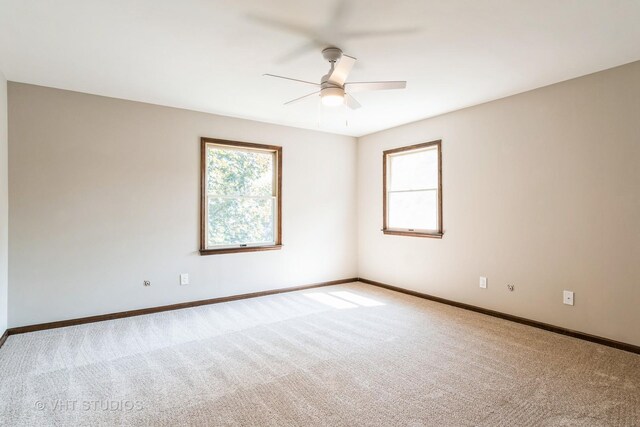 65 Old Post Rd, Montgomery, IL 60538 - spare room with carpet flooring and a ceiling fan
