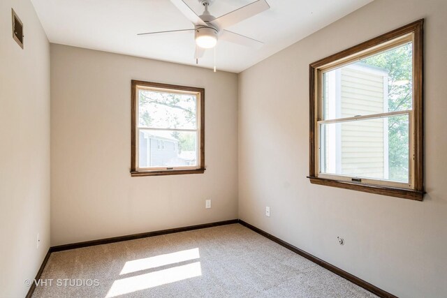 65 Old Post Rd, Montgomery, IL 60538 - spare room with carpet flooring and a ceiling fan