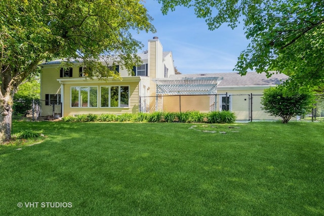 65 Old Post Rd, Montgomery, IL 60538 - rear view of house with a chimney