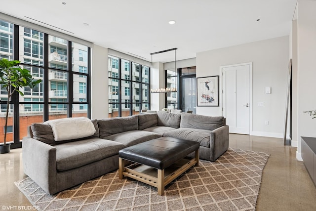 900 W Washington Blvd Unit 404, Chicago, IL 60607 - living room with baseboards and expansive windows
