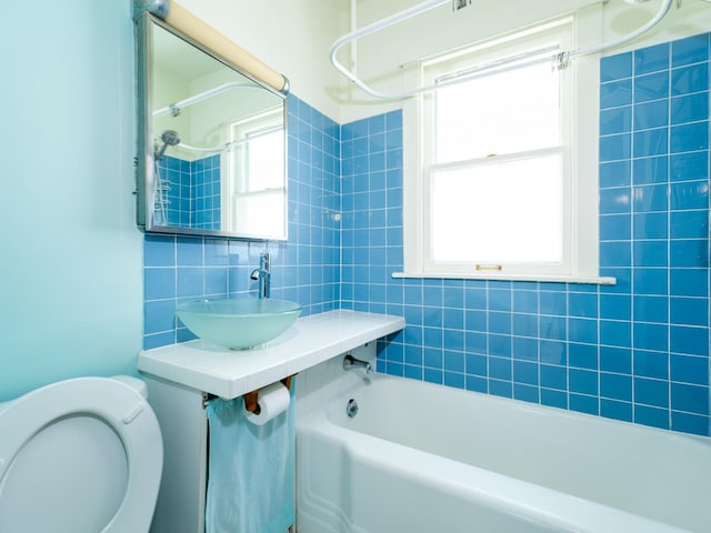 2839 N 75th Ct, Elmwood Park, IL 60707 - full bathroom featuring decorative backsplash and  shower combination