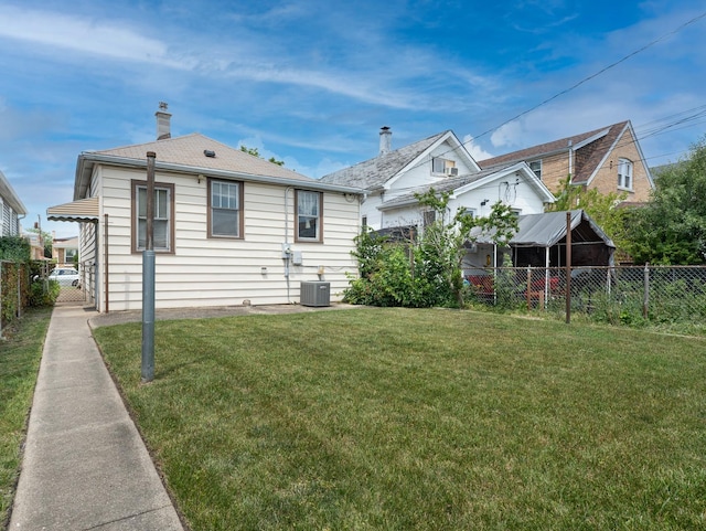 2839 N 75th Ct, Elmwood Park, IL 60707 - back of property featuring a fenced backyard