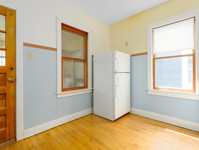 2839 N 75th Ct, Elmwood Park, IL 60707 - kitchen with freestanding refrigerator and hardwood / wood-style flooring