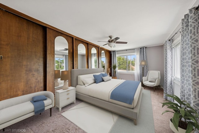 9205 S Utica Ave, Evergreen Park, IL 60805 - carpeted bedroom featuring multiple windows and a ceiling fan