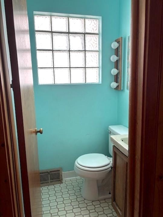 9205 S Utica Ave, Evergreen Park, IL 60805 - bathroom with vanity and tile patterned flooring