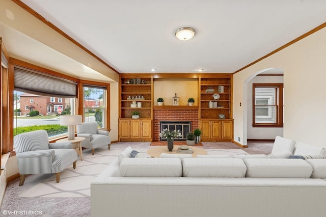 9205 S Utica Ave, Evergreen Park, IL 60805 - living area featuring light carpet, crown molding, arched walkways, and built in features