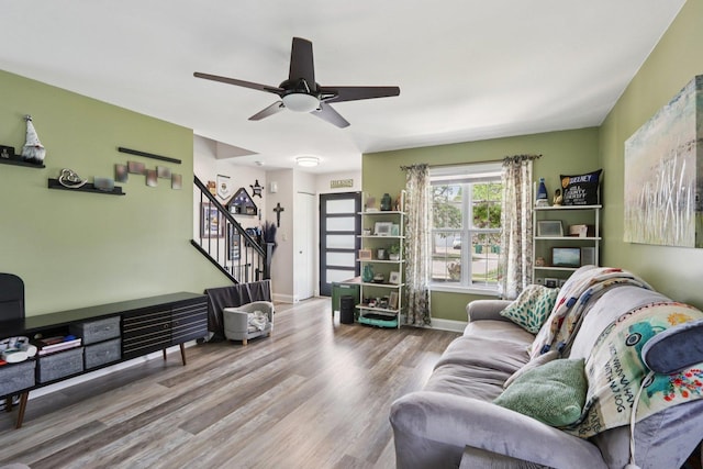 4203 Bunratty Ln, Plainfield, IL 60586 - living area featuring stairway, wood finished floors, and a ceiling fan