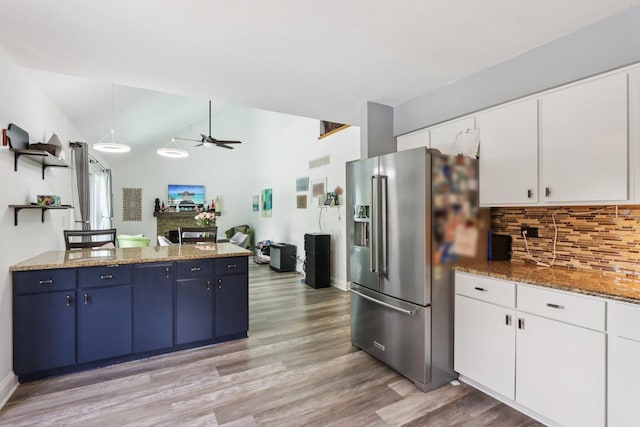 4203 Bunratty Ln, Plainfield, IL 60586 - kitchen with high end refrigerator, light wood finished floors, backsplash, open shelves, and a ceiling fan