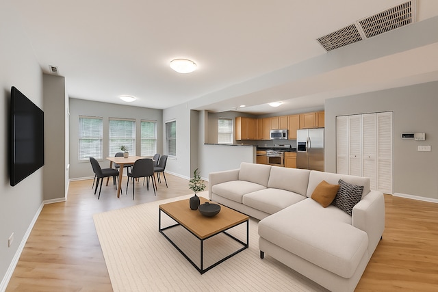 4653 N Lawndale Ave Unit 2S, Chicago, IL 60625 - living area with light wood-style flooring and plenty of natural light