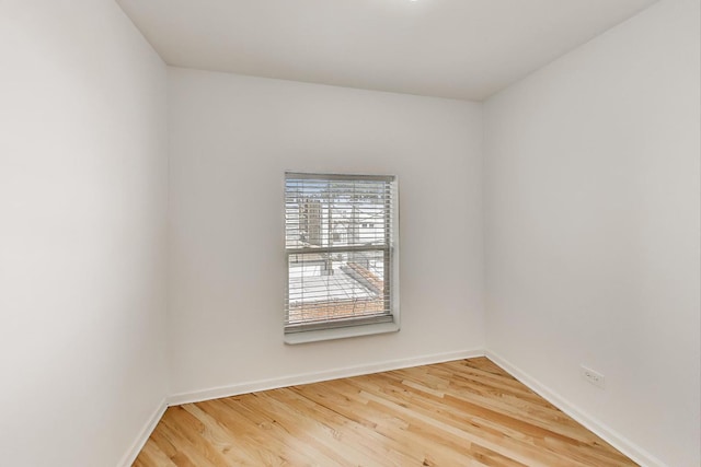 4653 N Lawndale Ave Unit 2S, Chicago, IL 60625 - unfurnished room with wood finished floors and baseboards