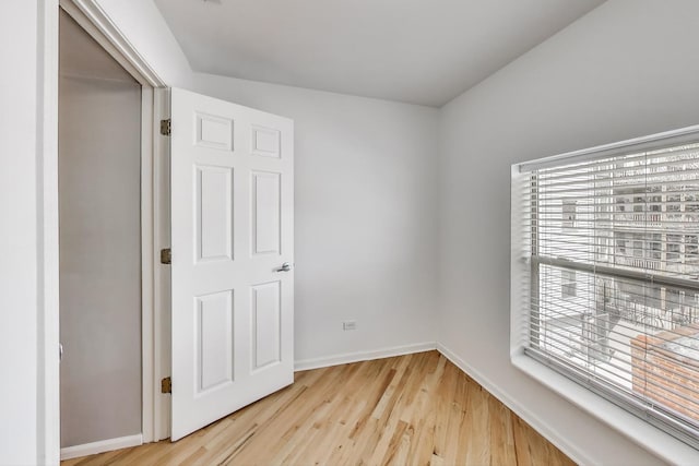 4653 N Lawndale Ave Unit 2S, Chicago, IL 60625 - unfurnished bedroom featuring light wood finished floors and baseboards