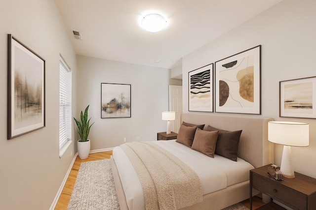 4653 N Lawndale Ave Unit 2S, Chicago, IL 60625 - bedroom featuring light wood-style flooring and baseboards