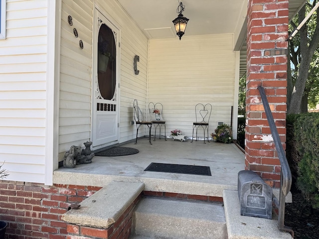 600 W White St, Clinton, IL 61727 - property entrance with covered porch