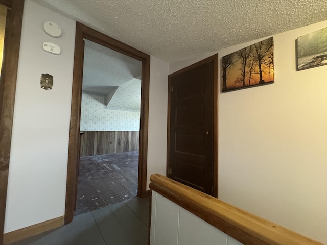 600 W White St, Clinton, IL 61727 - hall with a textured ceiling and tile patterned flooring