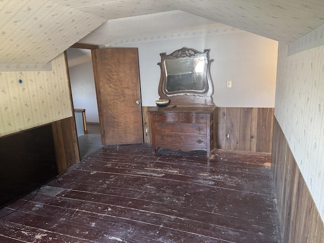 600 W White St, Clinton, IL 61727 - bonus room with wallpapered walls, wood-type flooring, a wainscoted wall, lofted ceiling, and wood walls