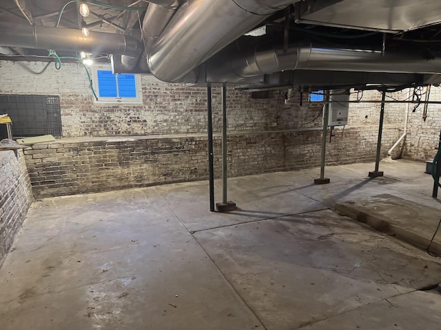 600 W White St, Clinton, IL 61727 - unfinished below grade area with electric panel