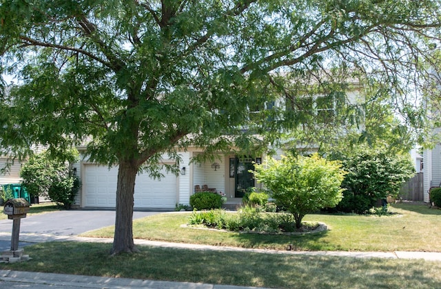 1818 Olde Mill Rd, Plainfield, IL 60586 - obstructed view of property featuring asphalt driveway, a front yard, and a garage