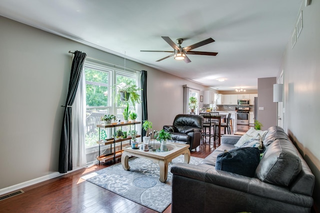 1818 Olde Mill Rd, Plainfield, IL 60586 - living area with a ceiling fan and wood-type flooring