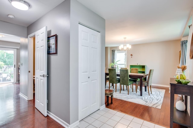 1818 Olde Mill Rd, Plainfield, IL 60586 - corridor with a chandelier and wood finished floors