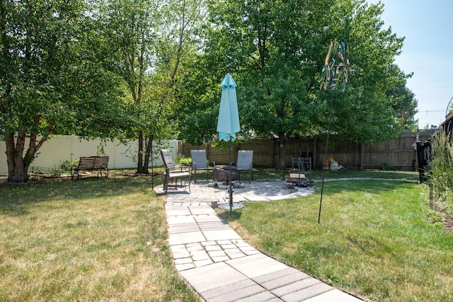 1818 Olde Mill Rd, Plainfield, IL 60586 - fenced backyard with a patio area and an outdoor fire pit