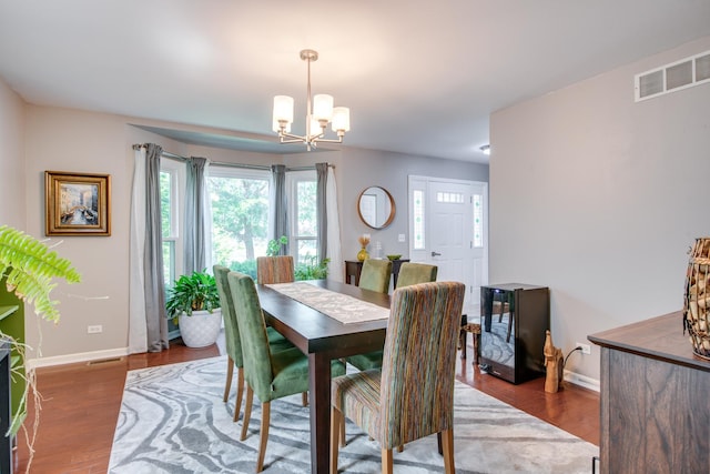 1818 Olde Mill Rd, Plainfield, IL 60586 - dining area with a chandelier and wood finished floors