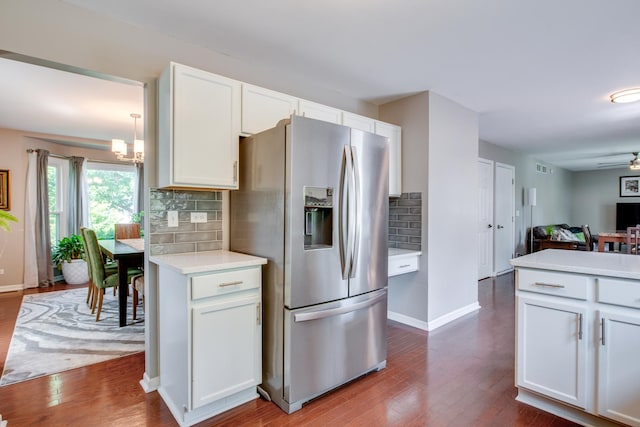 1818 Olde Mill Rd, Plainfield, IL 60586 - kitchen featuring stainless steel fridge with ice dispenser, dark wood-style floors, light countertops, backsplash, and white cabinets