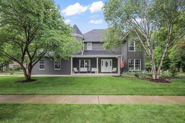 1091 Danforth Dr, Batavia, IL 60510 - view of front of property with covered porch, a front yard, and a shingled roof