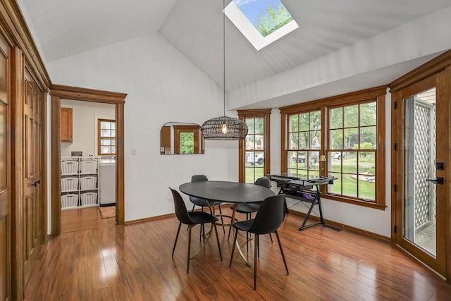 1091 Danforth Dr, Batavia, IL 60510 - dining area featuring a skylight, wood finished floors, plenty of natural light, and high vaulted ceiling
