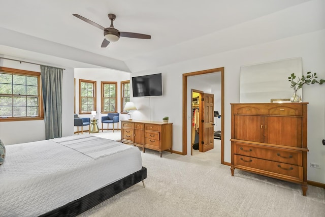 1091 Danforth Dr, Batavia, IL 60510 - bedroom with light colored carpet, a spacious closet, and a ceiling fan