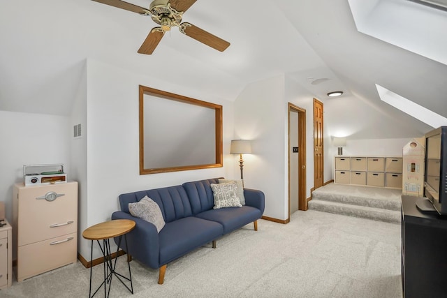 1091 Danforth Dr, Batavia, IL 60510 - living area featuring lofted ceiling, light colored carpet, a ceiling fan, and a skylight