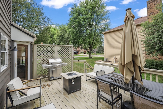 1091 Danforth Dr, Batavia, IL 60510 - deck featuring grilling area, a fire pit, and outdoor dining area
