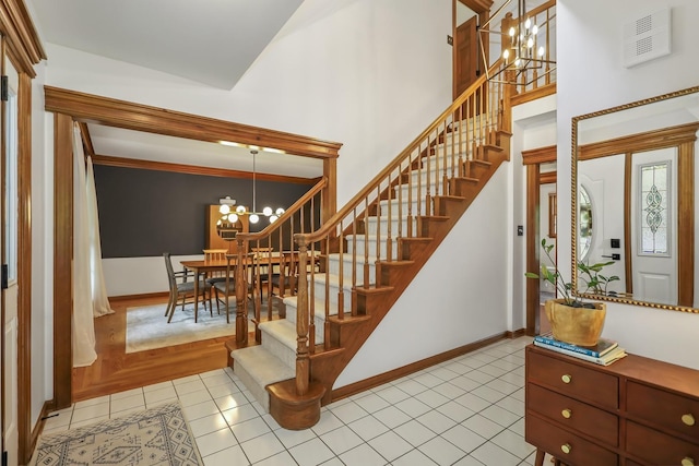 1091 Danforth Dr, Batavia, IL 60510 - tiled foyer with a chandelier, stairs, and a high ceiling
