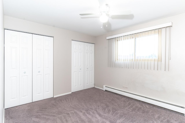 2537 Thatcher Ave Unit 3E, River Grove, IL 60171 - unfurnished bedroom featuring baseboard heating, carpet flooring, two closets, and ceiling fan
