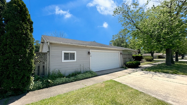 17303 Roy St, Lansing, IL 60438 - garage featuring driveway