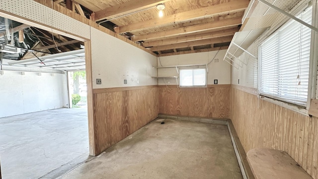 17303 Roy St, Lansing, IL 60438 - interior space featuring concrete floors, wooden walls, and a wainscoted wall