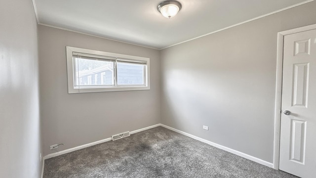 17303 Roy St, Lansing, IL 60438 - spare room featuring dark colored carpet and crown molding