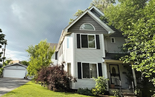 6120 W 98th St, Oak Lawn, IL 60453 - view of front of home featuring an outdoor structure, a garage, and a front yard