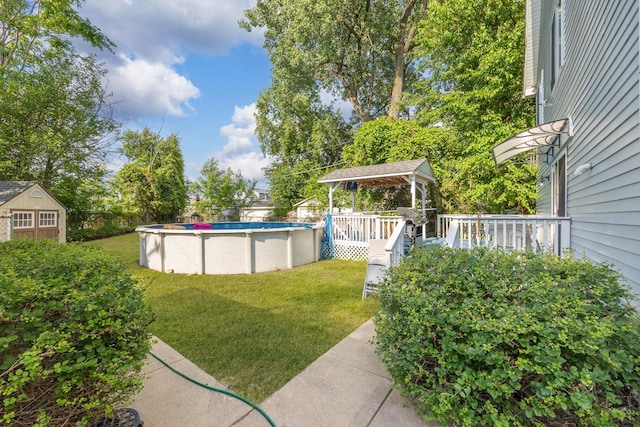 6120 W 98th St, Oak Lawn, IL 60453 - view of green lawn featuring a gazebo, an outdoor pool, and a storage shed