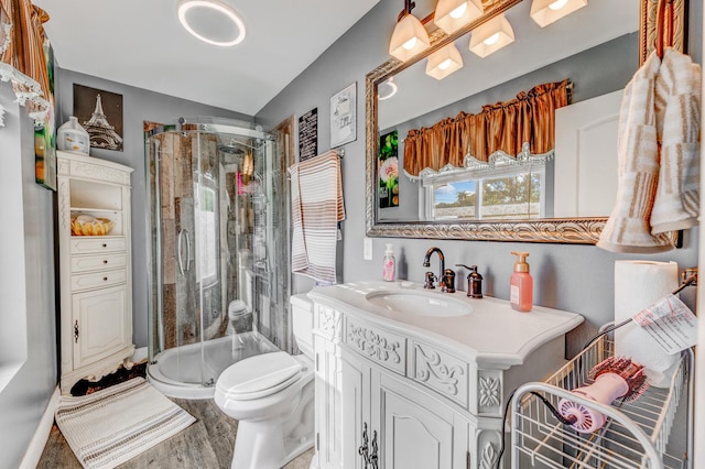 6120 W 98th St, Oak Lawn, IL 60453 - full bathroom featuring a stall shower, vanity, wood finished floors, and lofted ceiling