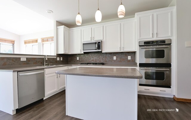 1305 Lilac Ln, Harvard, IL 60033 - kitchen featuring appliances with stainless steel finishes, plenty of natural light, and white cabinetry