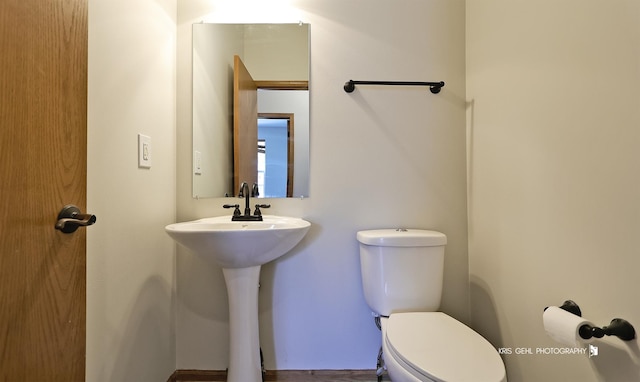 1305 Lilac Ln, Harvard, IL 60033 - half bath featuring toilet