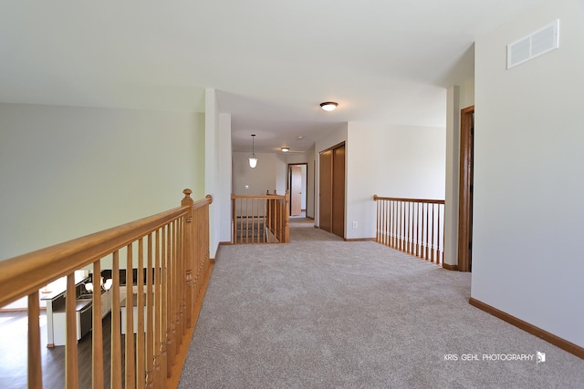1305 Lilac Ln, Harvard, IL 60033 - hallway with an upstairs landing and carpet