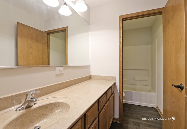1305 Lilac Ln, Harvard, IL 60033 - bathroom featuring vanity and wood finished floors