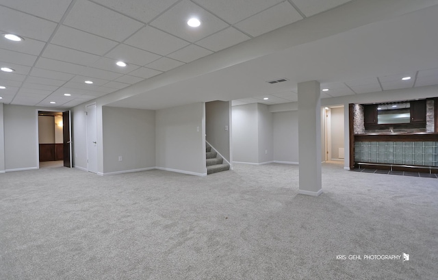 1305 Lilac Ln, Harvard, IL 60033 - finished basement featuring carpet flooring, stairs, recessed lighting, and a paneled ceiling