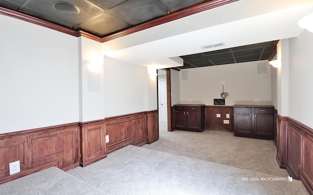 1305 Lilac Ln, Harvard, IL 60033 - bar featuring a wainscoted wall and light colored carpet