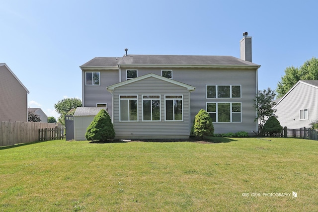 1305 Lilac Ln, Harvard, IL 60033 - back of house with a chimney