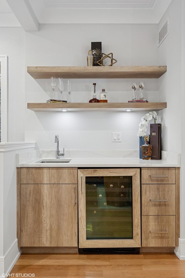 823 W George St Unit 1, Chicago, IL 60657 - indoor wet bar with wine cooler and light wood finished floors