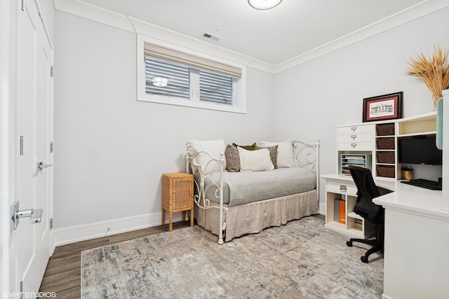 823 W George St Unit 1, Chicago, IL 60657 - bedroom with an office area, crown molding, and wood finished floors
